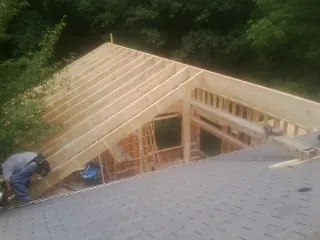 Framing a new roof addition that ties into an existing shingle roof in Land O Lakes